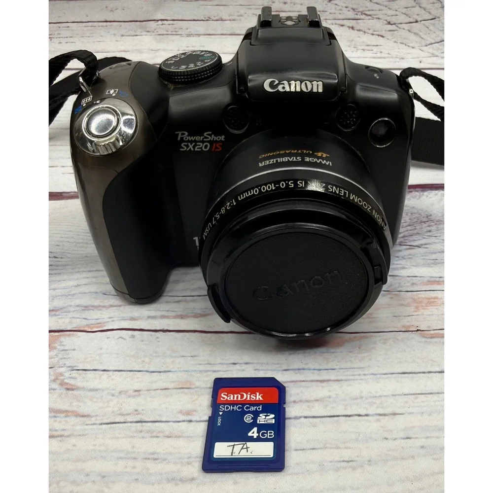 Canon PowerShot SX20 IS 12.1MP Digital Camera 20x Optical Zoom Black Bundle